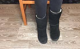 Student girl show nylon socks, boots and foot after study